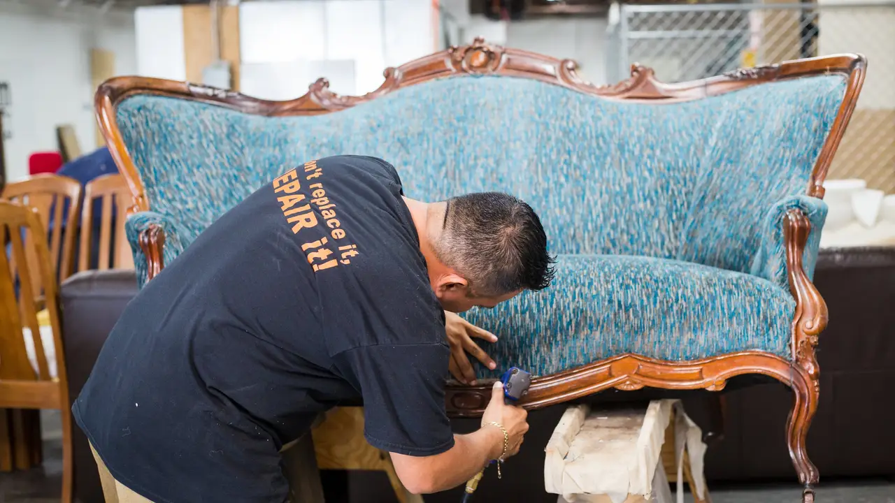 overhead view of corned beef sliced and on a platter with cabbage, potatoes, and carrots